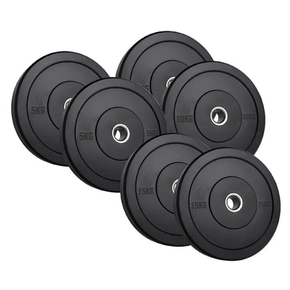 Set of black weight plates with weight markings on a white background
