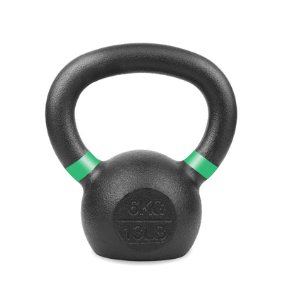 Black kettlebell with green accents on a white background