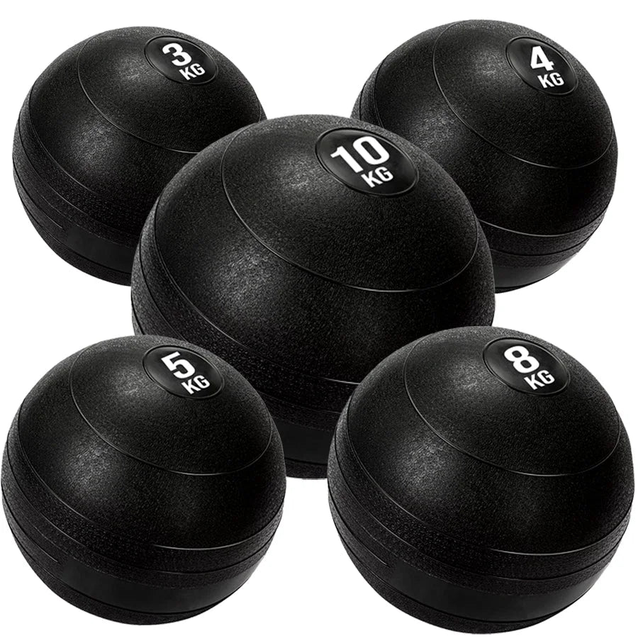 Set of black weighted exercise balls with varying weights on a white background