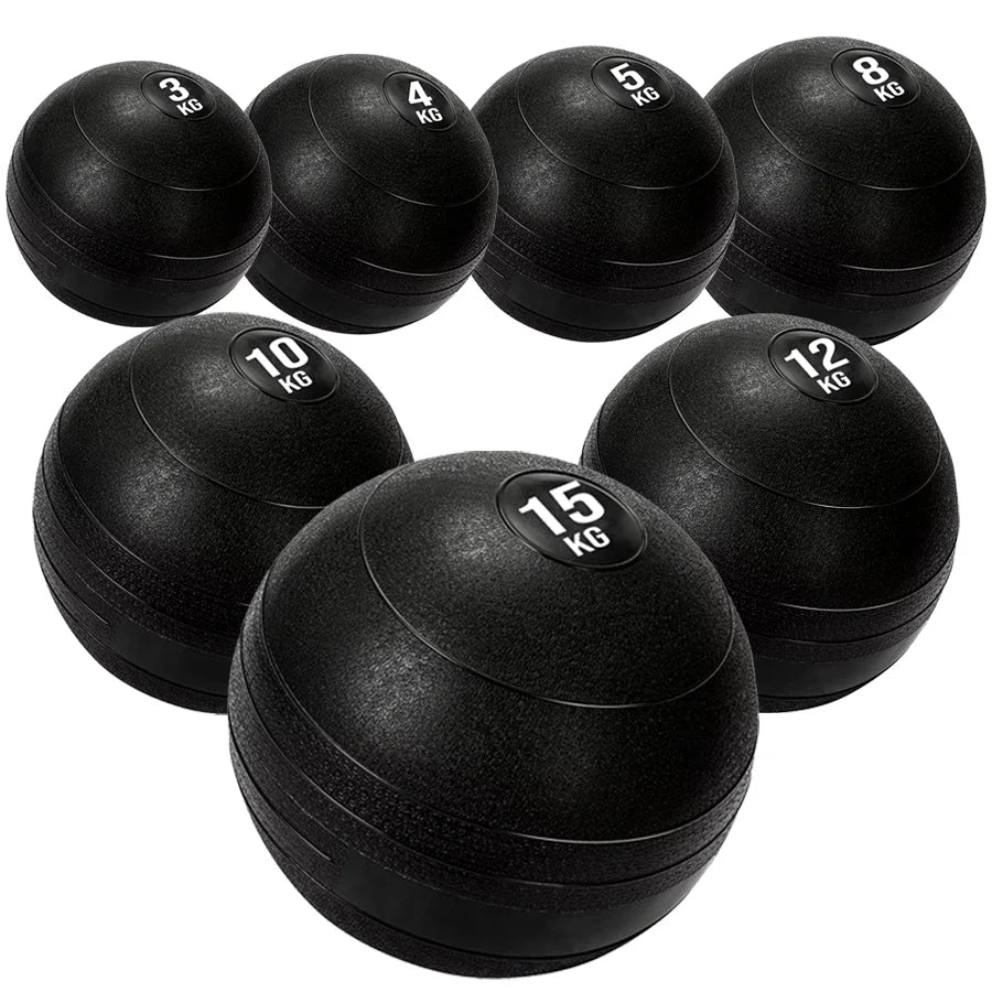 Set of black weight balls with varying weights on a white background